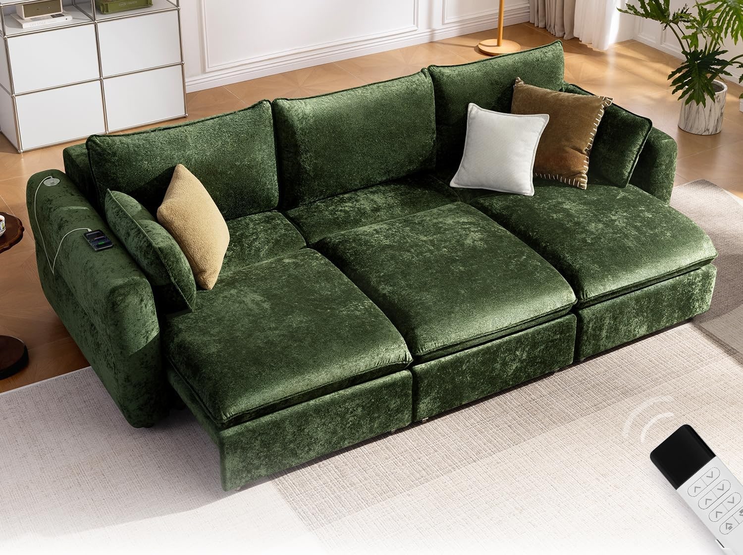 Green velvet CHIC HOUSE DOVA extendable sofa with all three seats extended in a bright living room