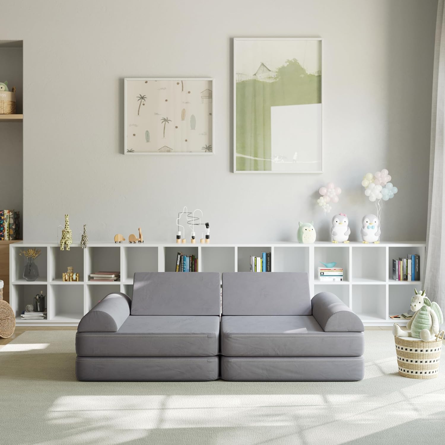 Gray Flash Furniture play couch in a bright playroom with books and toys